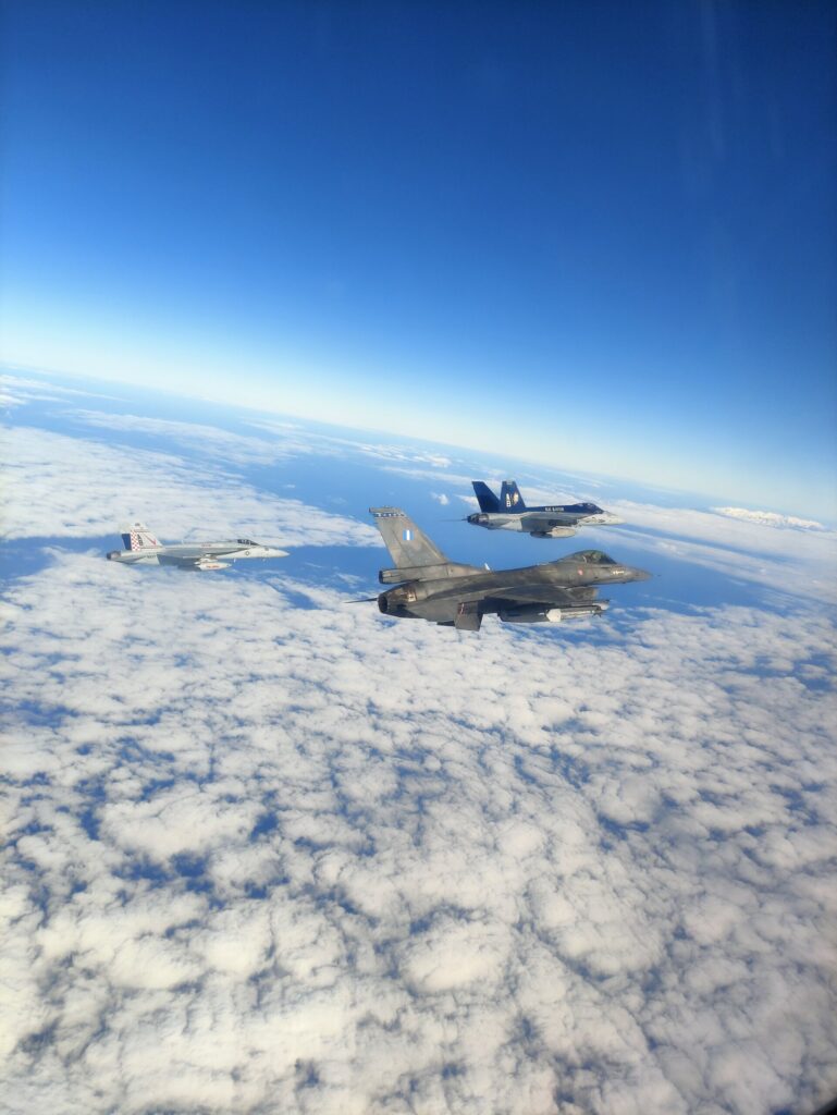 Greek F-16 flying alongside US F-18 Fighter jets
