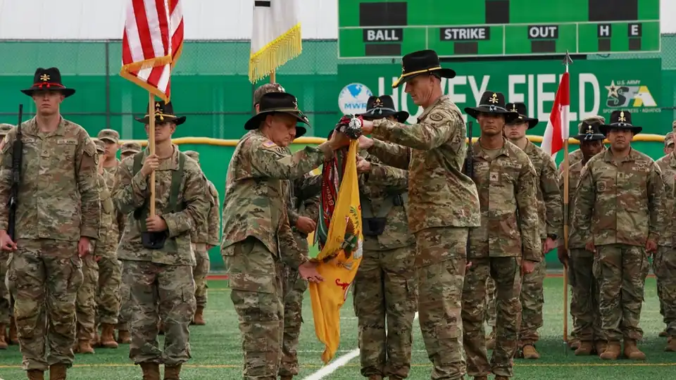 Soldiers of the 3rd Cavalry Regiment uncase the regimental colors at Hovey Field, Camp Hovey, South Korea