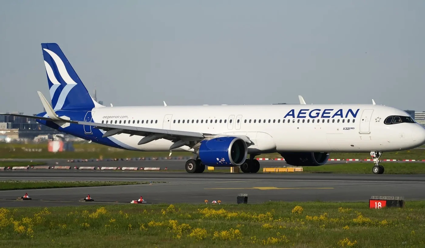 AEGEAN Airbus A321neo in the airline's blue and white livery taxiing on an airport apron