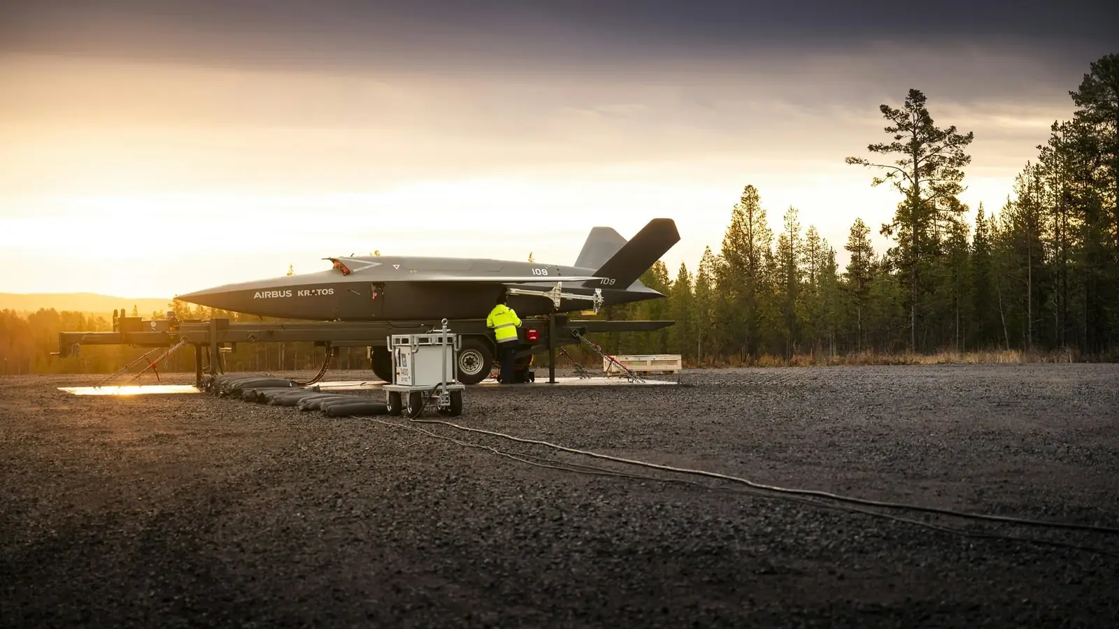 The Airbus U740 Valkyrie on the ground before the first flight, with a technician next to ground equipment