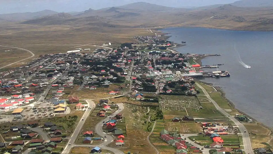 Aerial view of Stanley, the capital of the Falkland Islands, beside its harbour