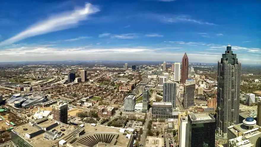 Aerial view of downtown Atlanta, Georgia, under a blue sky