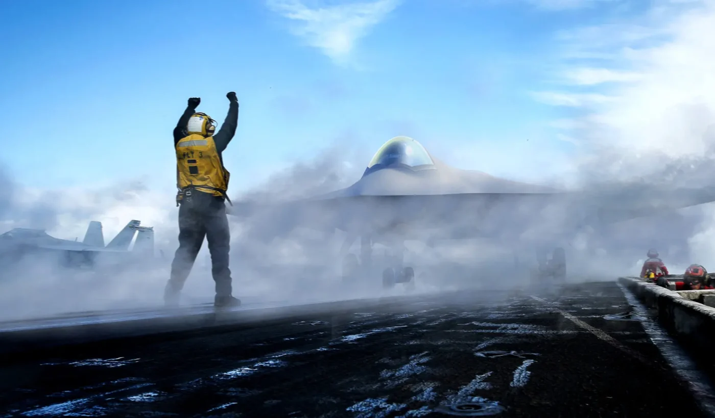 US Navy artist rendering of Boeing F/A-XX sixth-generation fighter on an aircraft carrier deck