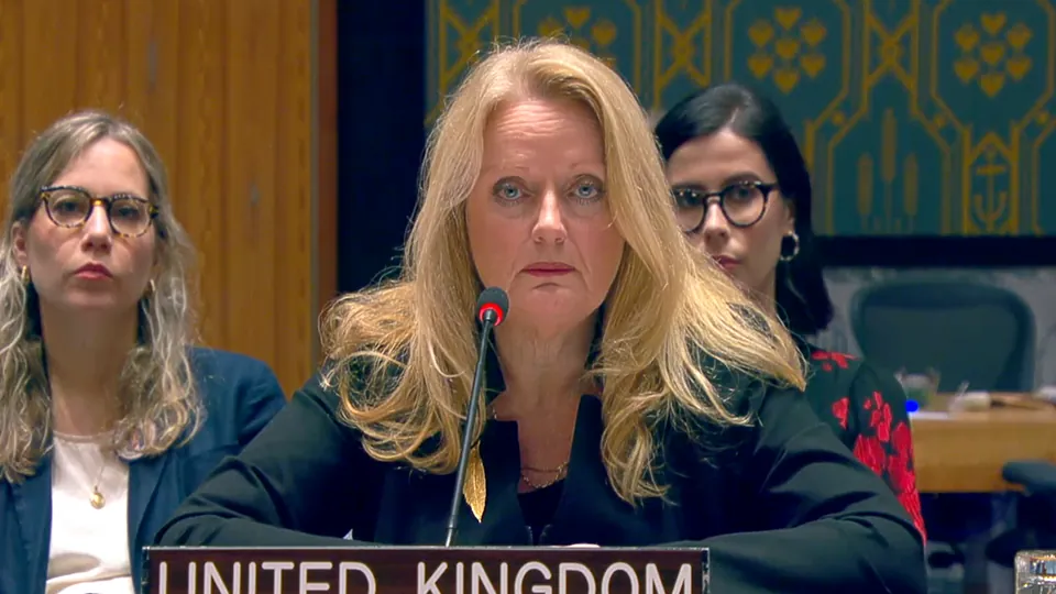 The UK representative speaking at the UN Security Council behind a United Kingdom nameplate
