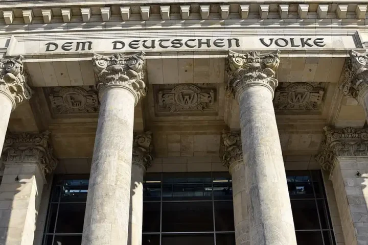 Columns and the inscription Dem Deutschen Volke on the front of the Reichstag building in Berlin, seat of the Bundestag