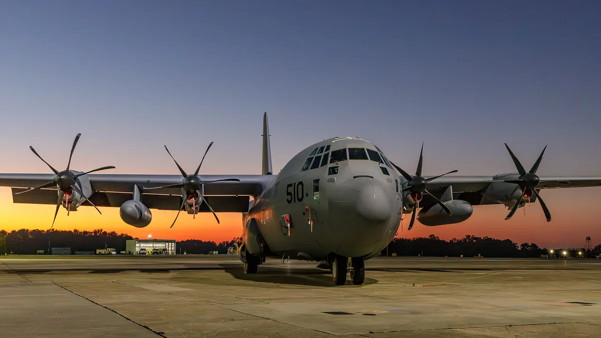 A C-130J-30 Super Hercules, number 510, parked on the ramp at dusk at Marietta, Georgia