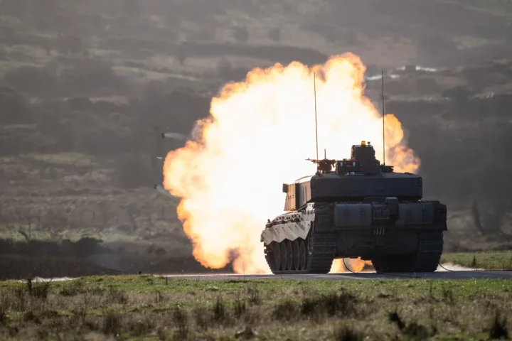 British Challenger 3 main battle tank on a firing range as it fires its main gun