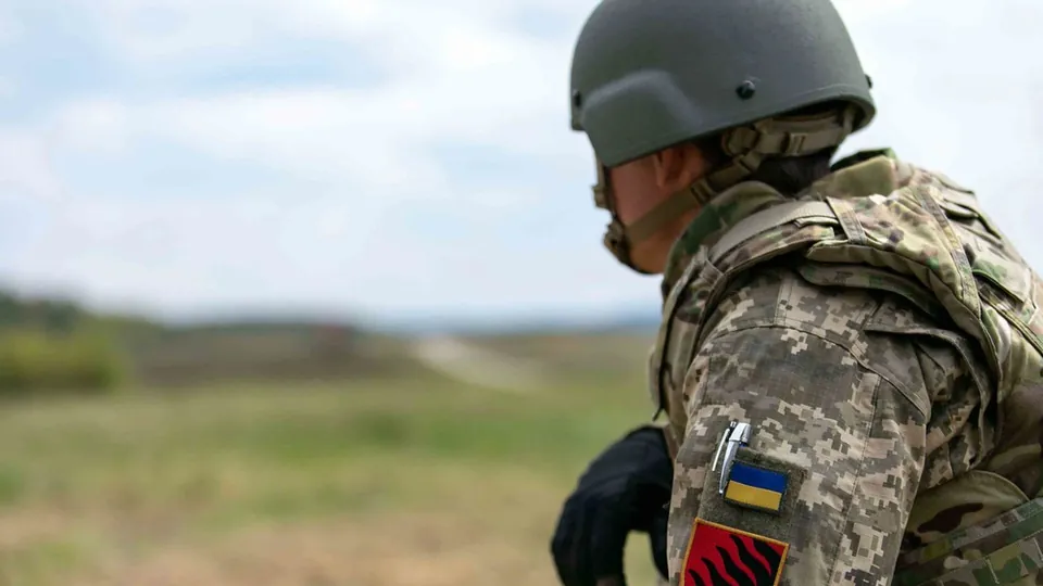 A Ukrainian soldier watches the horizon during training at the Grafenwoehr Training Area in Germany