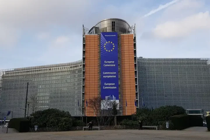 The Berlaymont building, headquarters of the European Commission in Brussels, with an EU banner on its facade
