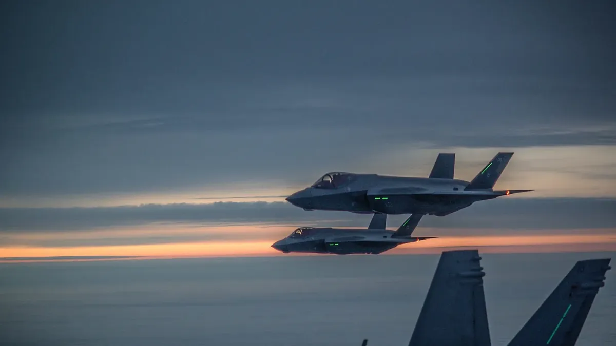 Finnish F-35As JF-509 and JF-511 on the flight to Rovaniemi escorted by Hornets