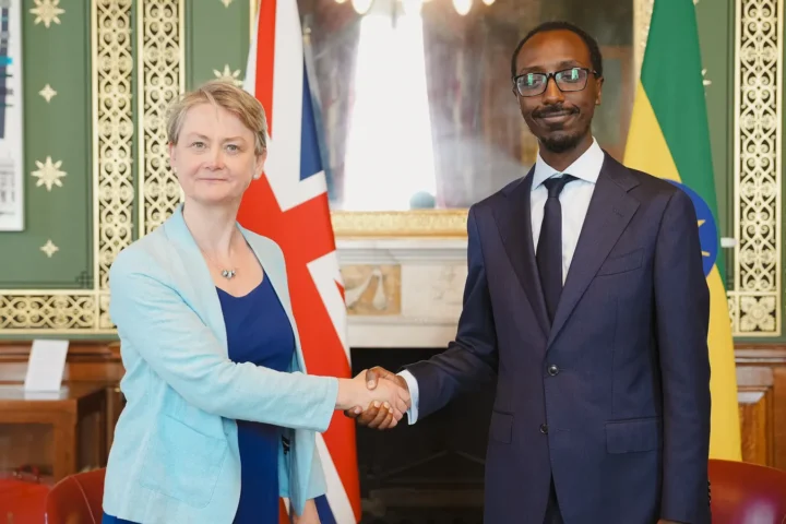 Ethiopian Foreign Minister Gedion Timothewos shaking hands with UK Foreign Secretary Yvette Cooper