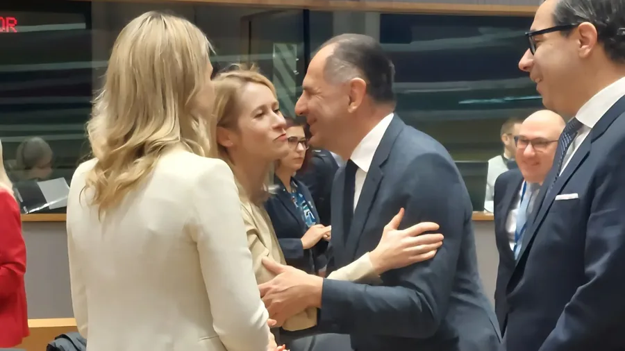 Greek Foreign Minister George Gerapetritis greeting colleagues at the EU Foreign Affairs Council in Brussels