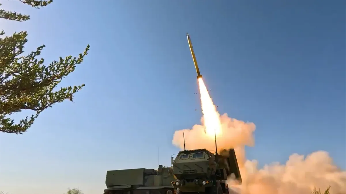 A GMLRS rocket leaving a HIMARS launcher
