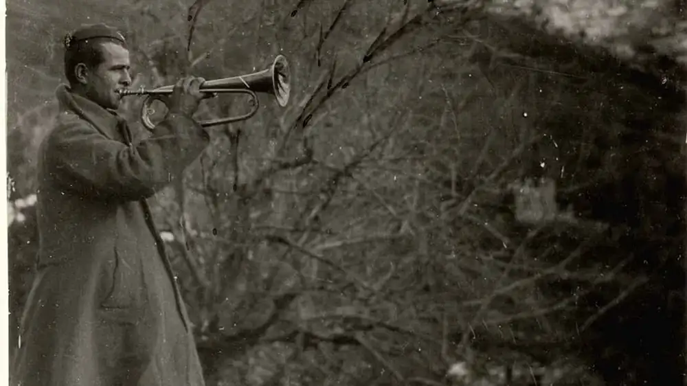 A Greek bugler gives the signal for the attack before the capture of the Kleisoura pass