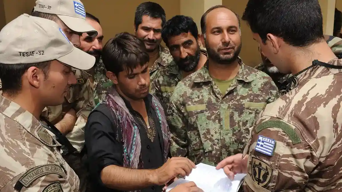 Greek advisers of the NATO Training Mission-Afghanistan teaching Afghan trainees at the Kabul Military Training Centre