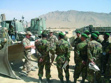 Greek TESAF officers training Afghan soldiers on heavy engineering vehicles