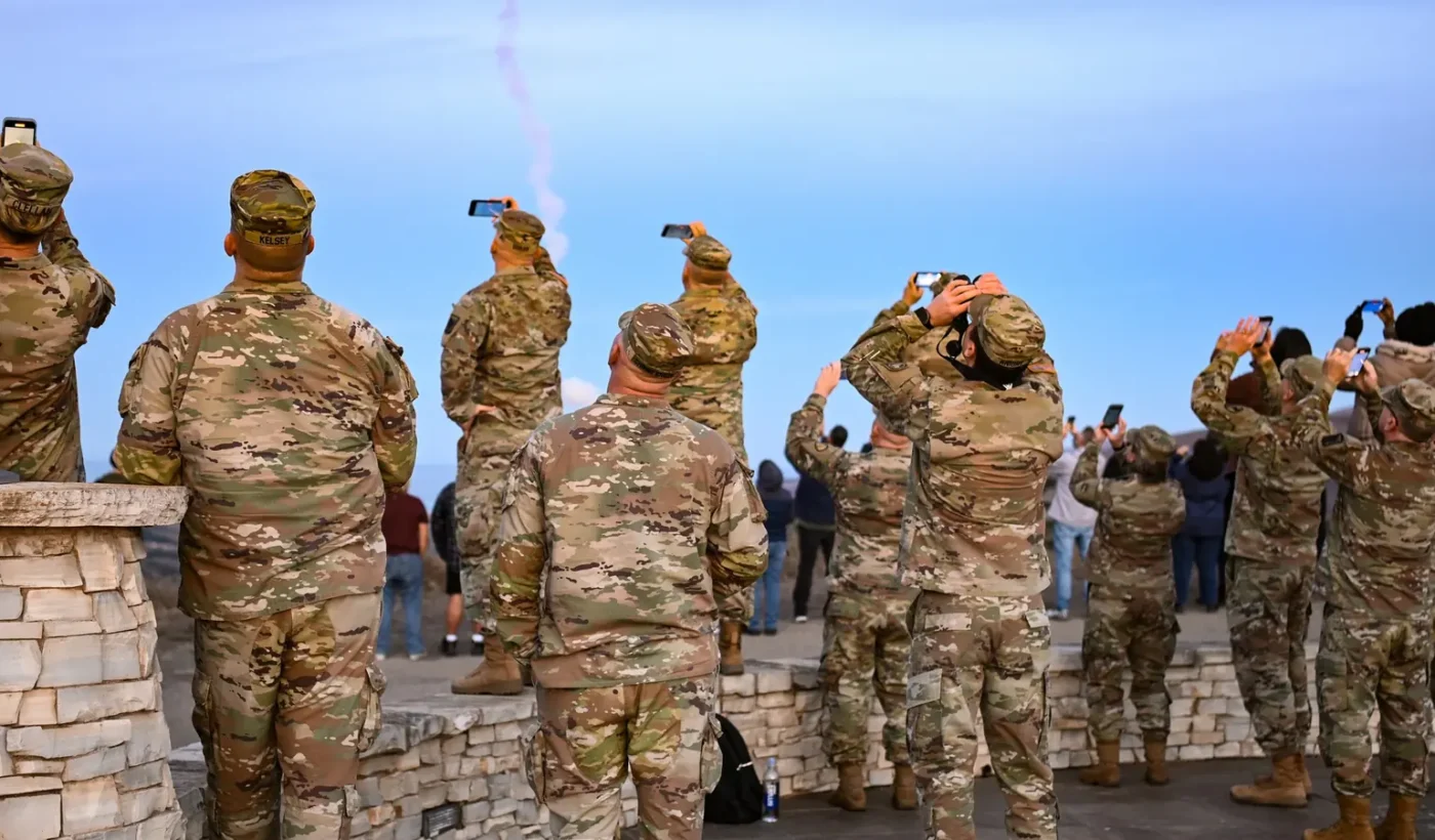 Service members watch the launch of a Ground-based Interceptor of the GMD system from Vandenberg during test FTG-12