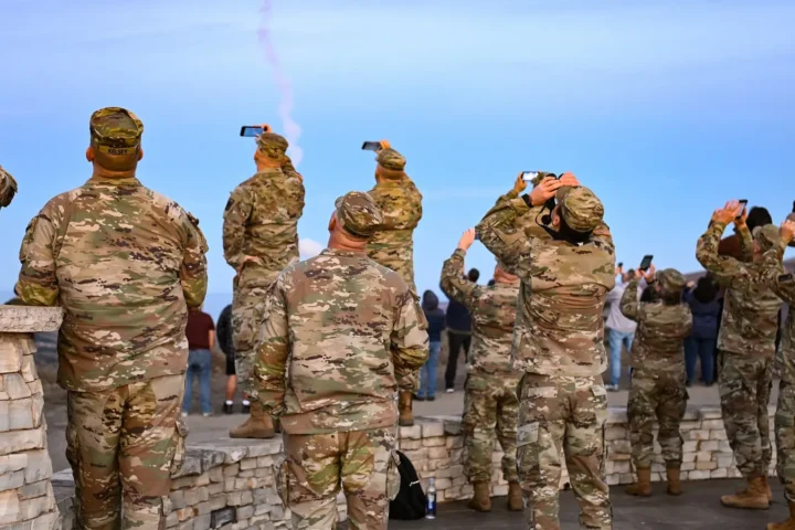 Service members watch the launch of a Ground-based Interceptor of the GMD system from Vandenberg during test FTG-12