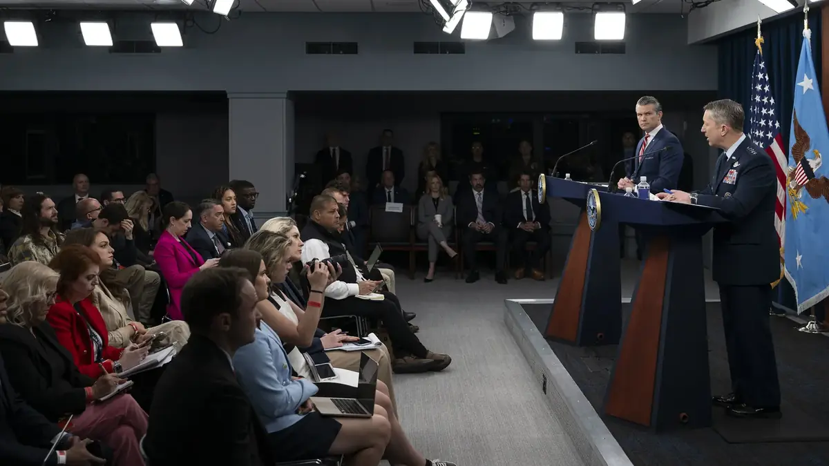 Secretary of War Pete Hegseth and Chairman of the Joint Chiefs of Staff Gen. Dan Caine at a press briefing at the Pentagon, May 5, 2026