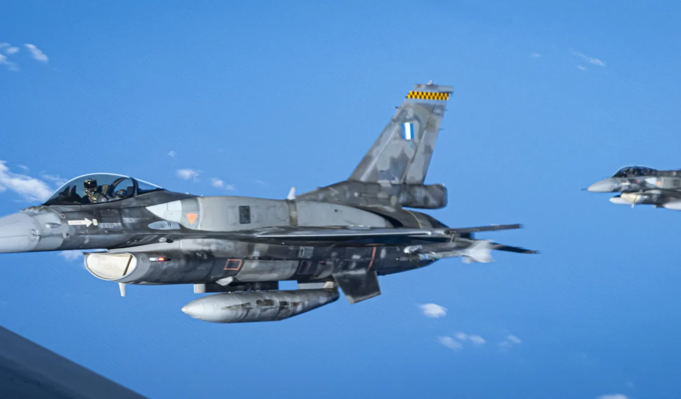 Two Hellenic Air Force F-16D fighters flying during Falcon Strike 2025 over the Atlantic Ocean.
