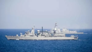 The Hellenic Navy frigate Nikiforos Fokas at sea in the Mediterranean with the US destroyer Winston S. Churchill in the background