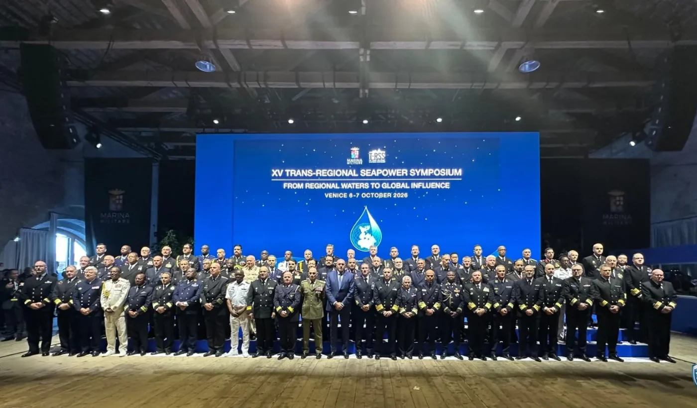 Navy chiefs and delegates in a group photo in front of a screen reading XV Trans-Regional Seapower Symposium, Venice 6-7 October 2026