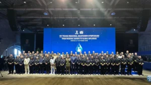 Navy chiefs and delegates in a group photo in front of a screen reading XV Trans-Regional Seapower Symposium, Venice 6-7 October 2026