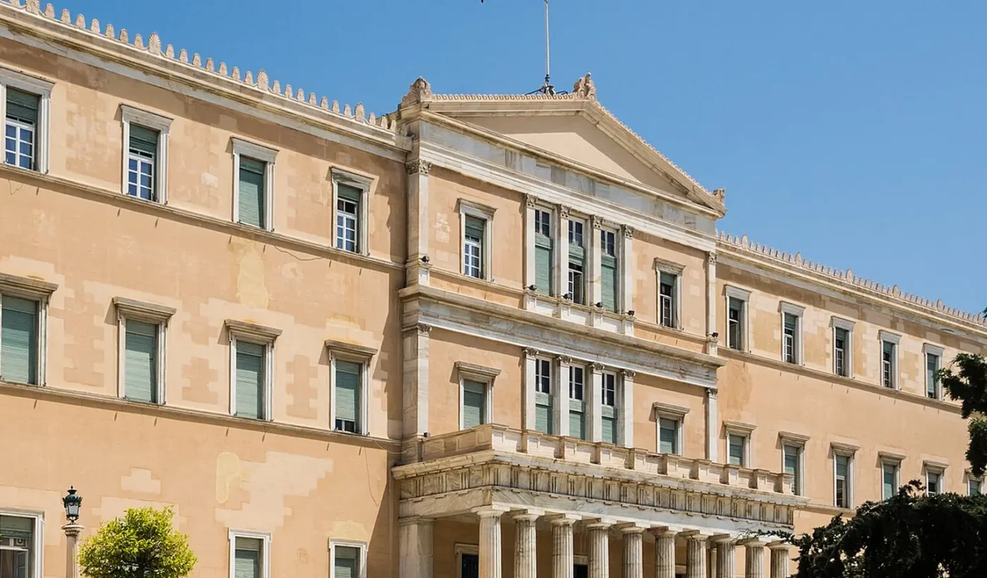 The main facade of the Hellenic Parliament building in Syntagma Square, Athens