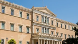 The main facade of the Hellenic Parliament building in Syntagma Square, Athens