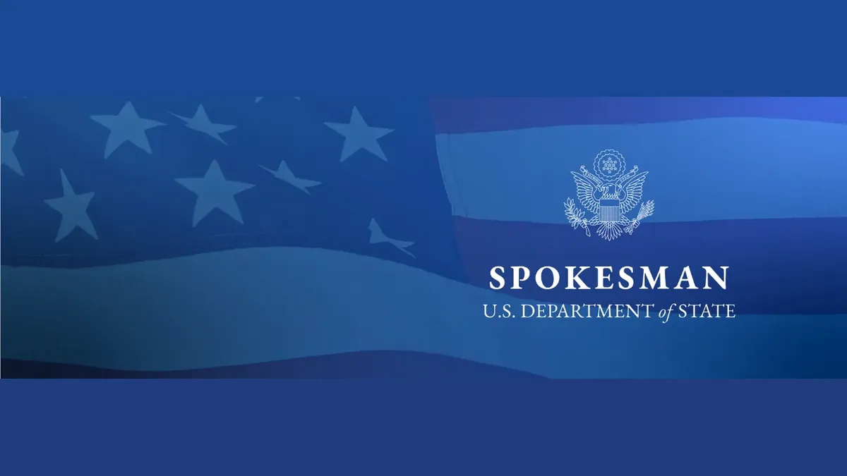 The emblem of the US State Department spokesperson’s office on a blue background
