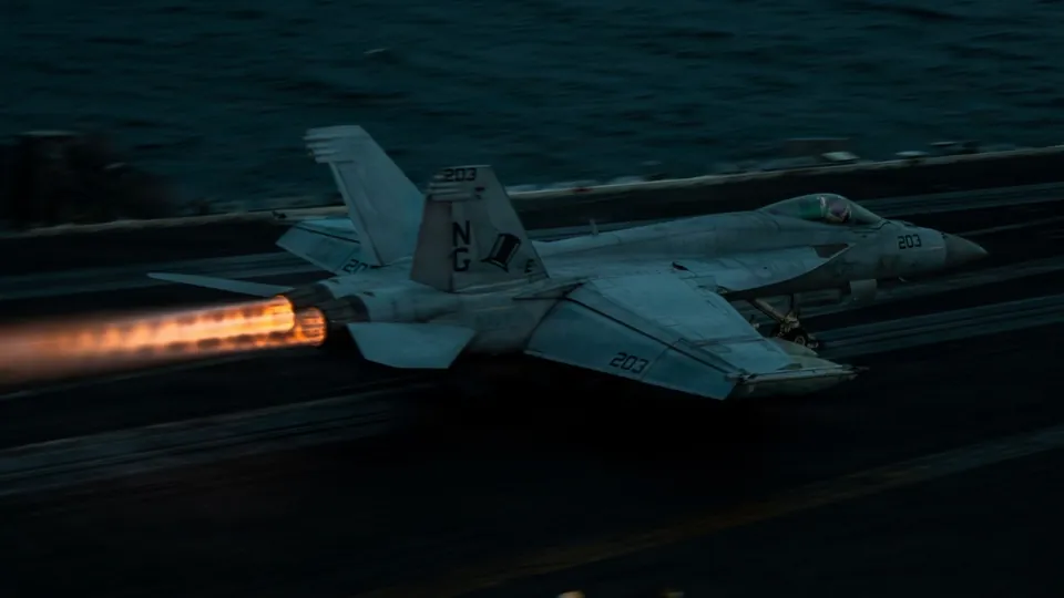 An F/A-18E Super Hornet launches from the flight deck of the aircraft carrier USS Abraham Lincoln during Operation Epic Fury