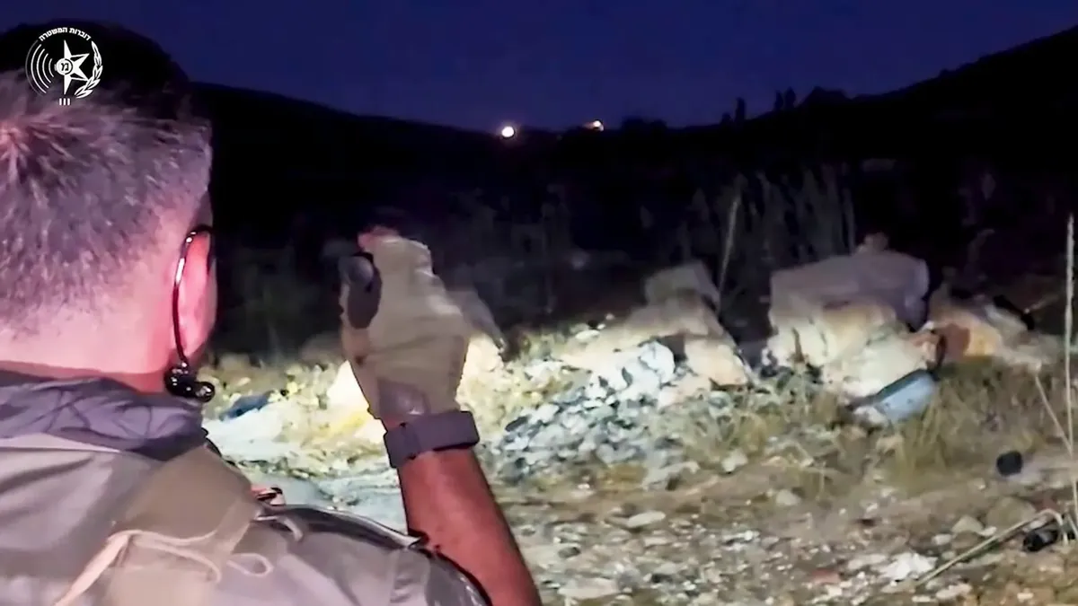 Israeli police officers during the pre-dawn operation in the Binyamin area of the West Bank