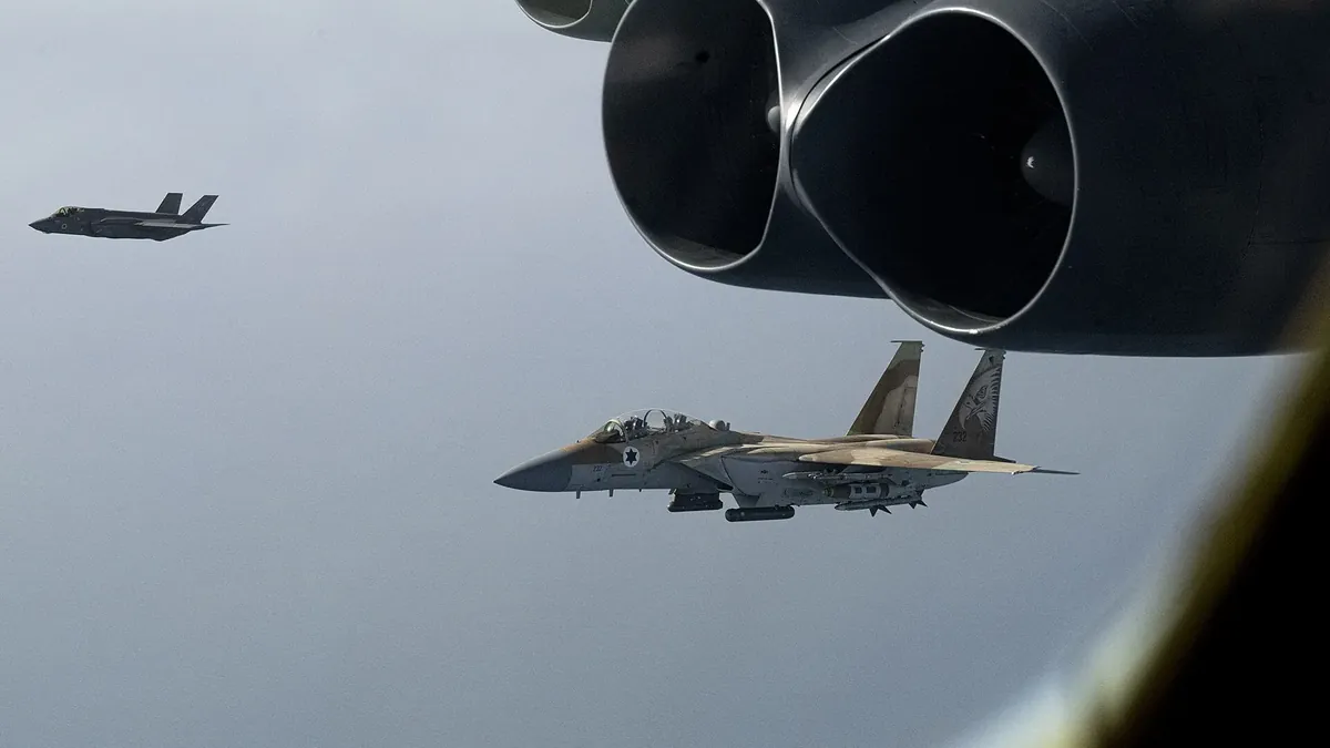 Israeli F-15 and F-35I fighters flying alongside a US Air Force B-52H bomber
