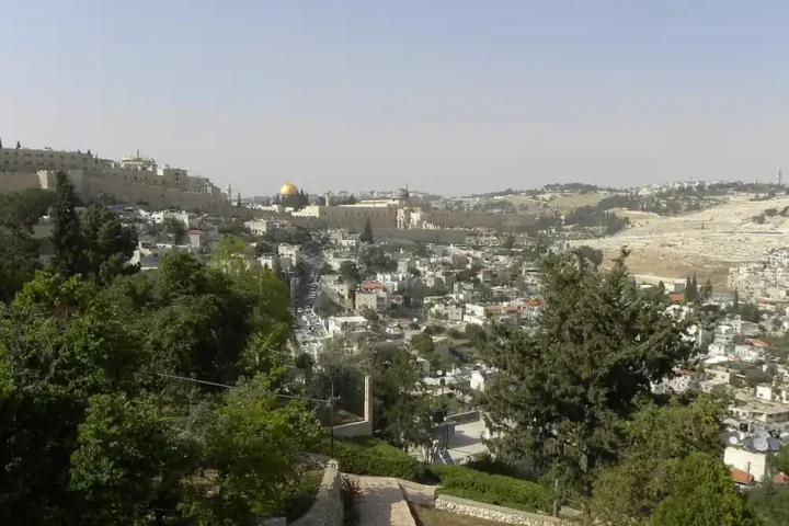 View over East Jerusalem towards the walls and the golden dome of the Old City