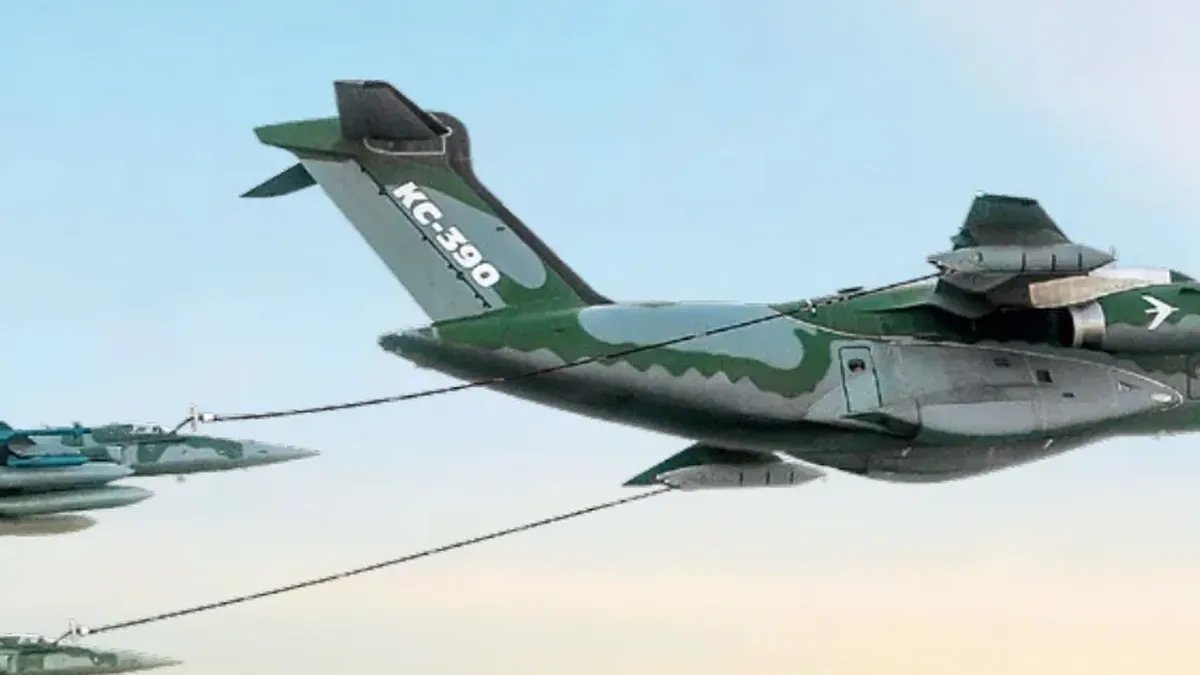The KC-390 refuelling two Brazilian Air Force F-5 fighters with wing pods