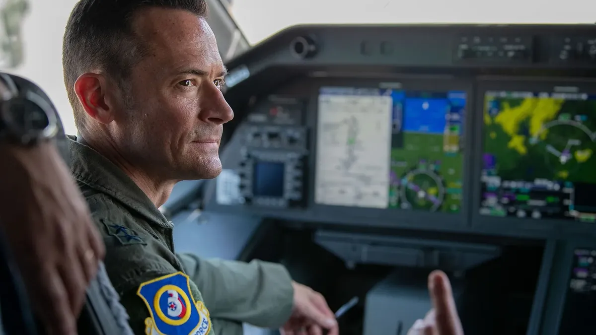 A US Air Force officer in the cockpit of a Portuguese Air Force KC-390 at Air Base 11 in Beja