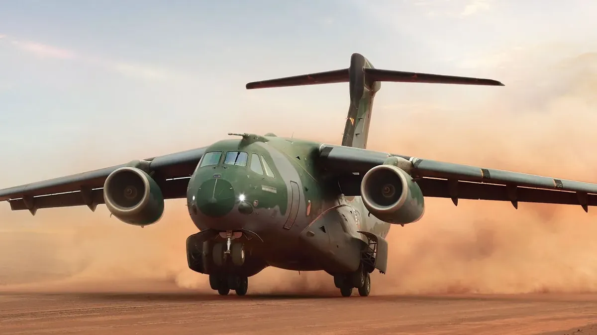 The KC-390 landing on a dirt runway