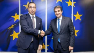 Cypriot Foreign Minister Constantinos Kombos, left, with European Commission Executive Vice-President Raffaele Fitto in Brussels