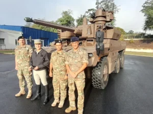 Cypriot National Guard officers together with a French officer in front of an EBRC Jaguar during their visit to France