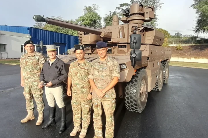 Cypriot National Guard officers together with a French officer in front of an EBRC Jaguar during their visit to France
