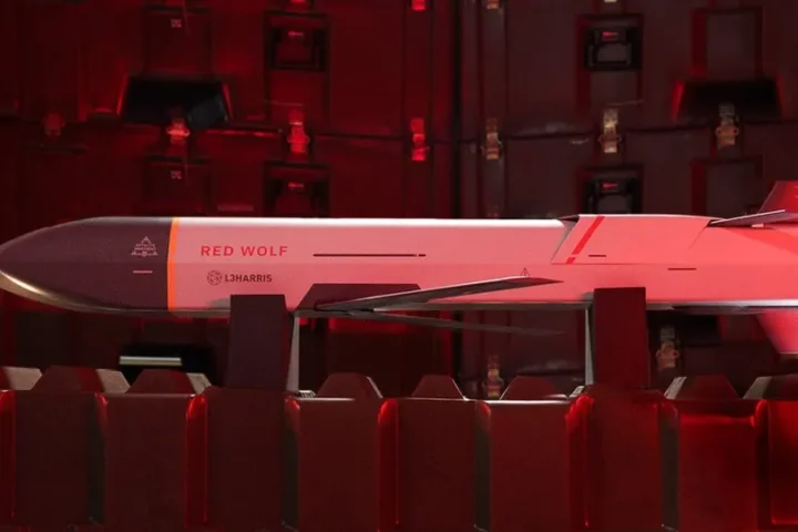 Red Wolf launched effect air vehicle displayed against a red-lit background