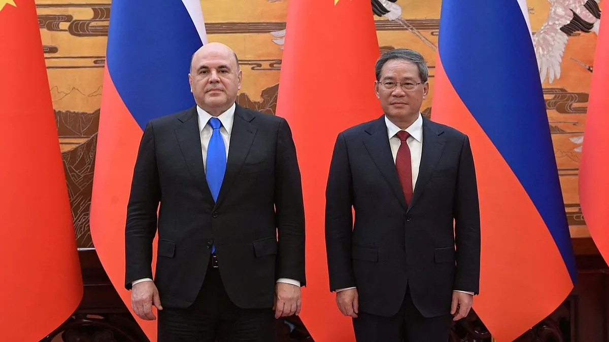 Chinese Premier Li Qiang and Russian Prime Minister Mikhail Mishustin at talks in 2023