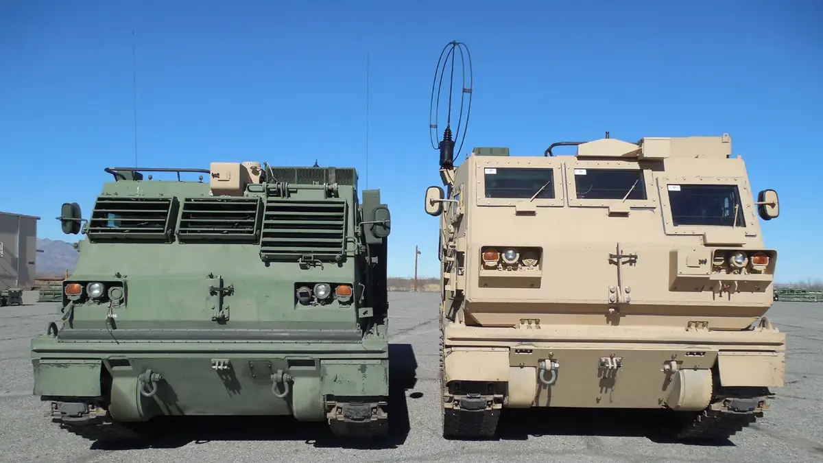 The old M270 cab next to the new armoured M270A2 cab