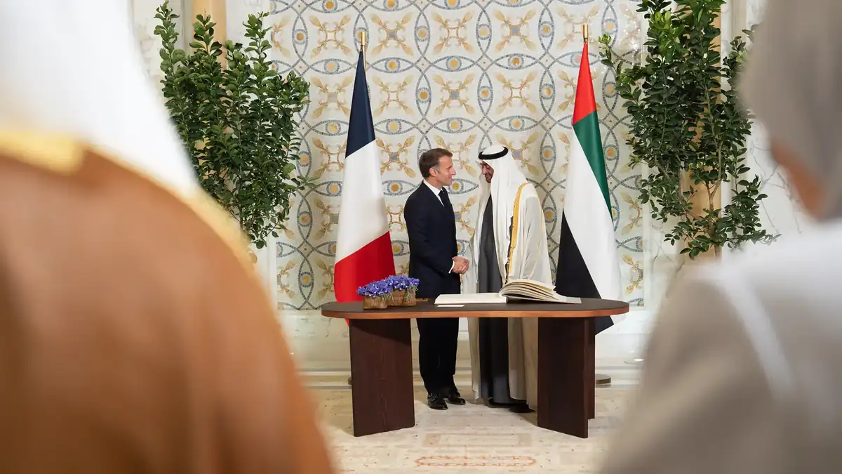 Emmanuel Macron smiling during his Gulf tour in the United Arab Emirates