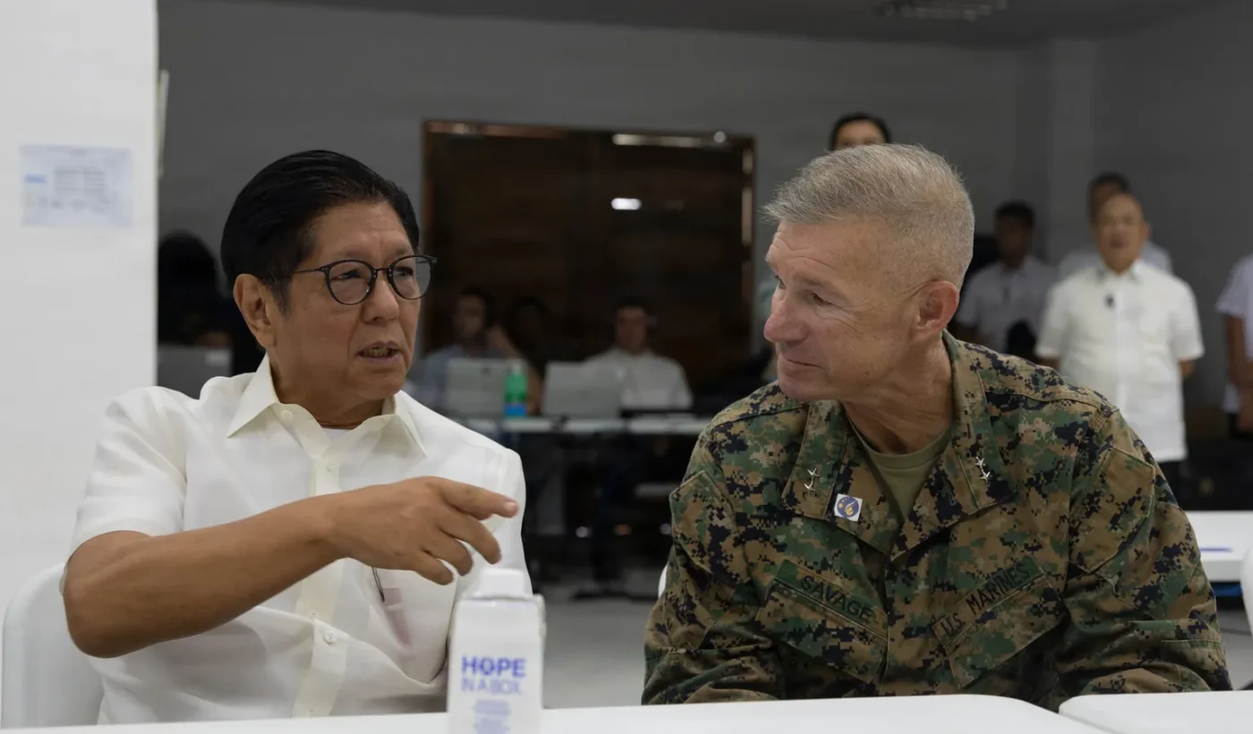Philippine President Ferdinand Marcos Jr. speaking with a US Marine Corps brigadier general during Balikatan 2026