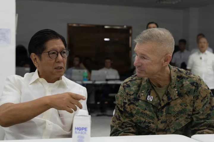 Philippine President Ferdinand Marcos Jr. speaking with a US Marine Corps brigadier general during Balikatan 2026