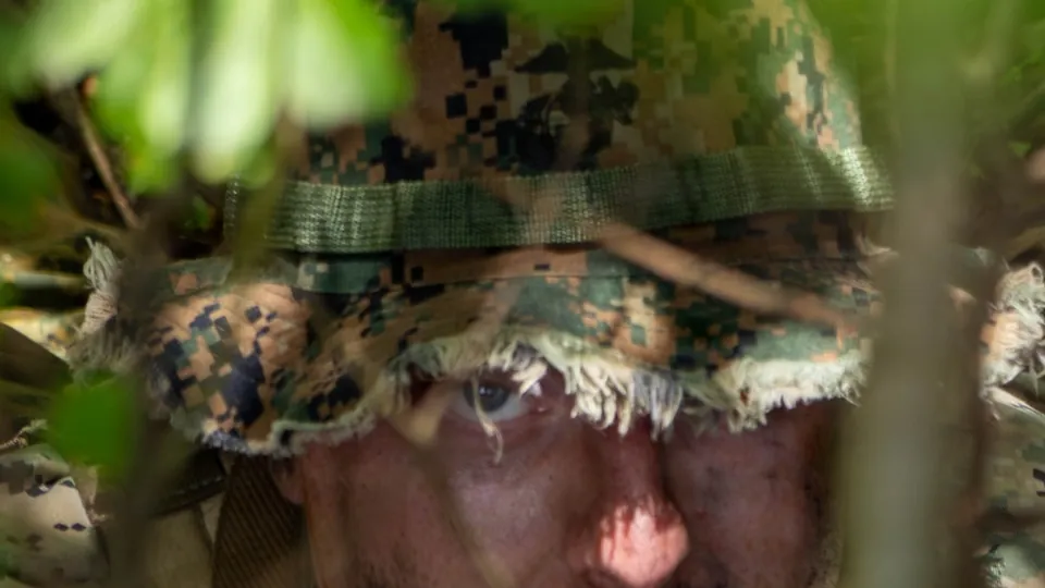 A U.S. Marine reconnaissance specialist poses for a photo during a multi-domain reconnaissance course at Camp Lejeune