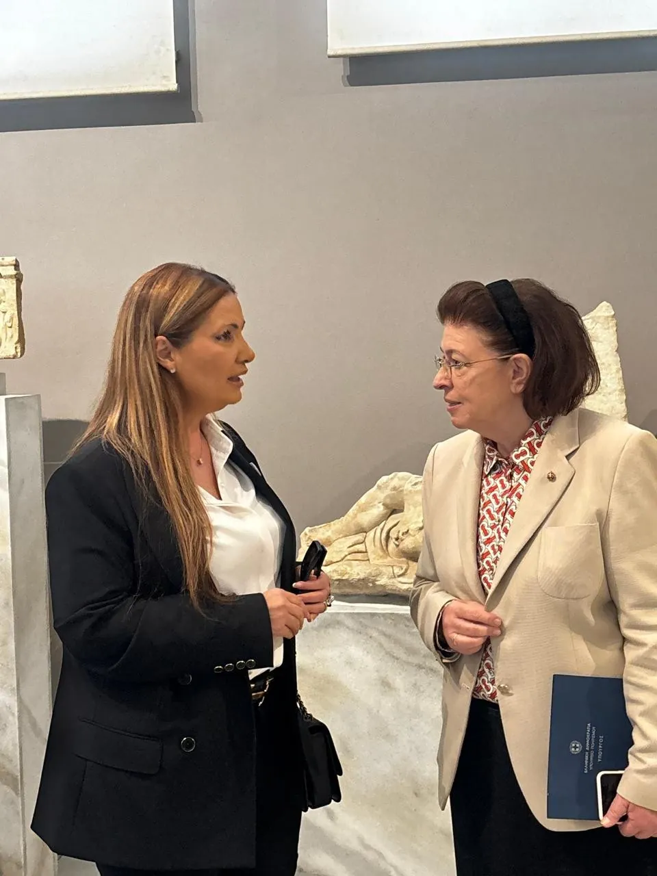 Culture Minister Lina Mendoni speaking with Israeli ambassador Pninat Yanay at the National Archaeological Museum