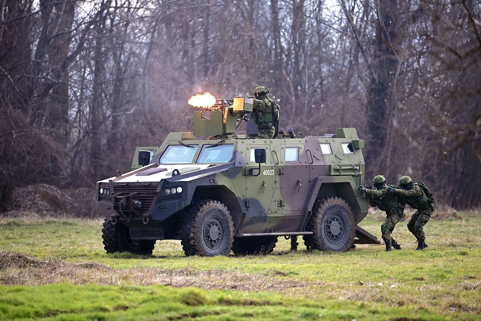 The Serbian Miloš 4x4 armoured vehicle in an exercise, firing from its weapon station