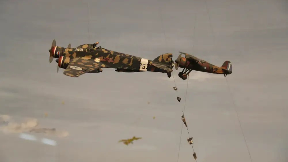 Diorama at the War Museum of Athens showing a Greek PZL P.24 cutting off the tail of an Italian bomber